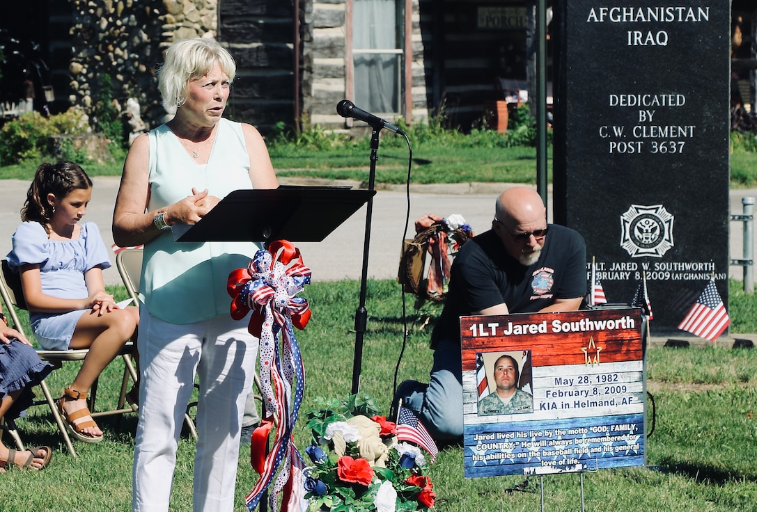 Kim Southworth talks about her son's love of the community during a dedication ceremony on July 6 as a section of State Highway 133 through Oakland, Illinois, was named the 1st Lt. Jared W. Southworth Highway.