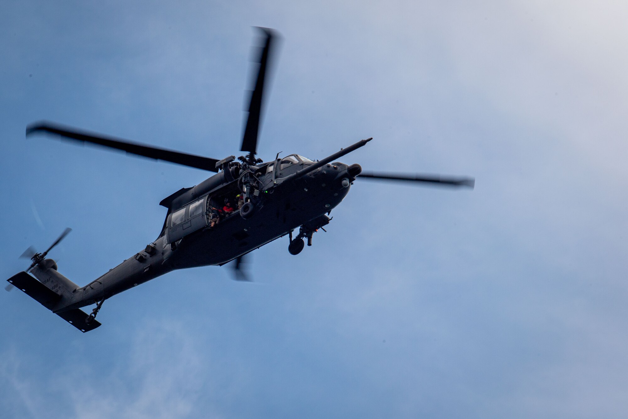 U.S. Air Force HH-60W Jolly Green II pilots and crew depart from a water operation exercise in the Gulf of Mexico, June 24, 2024. The HH-60W is designed from the ground up with integrated mission systems that improve situational awareness for aircrews conducting combat search and rescue missions in contested environments. The helicopters feature new multi-function displays to provide pilots with critical flight information. (U.S. Air Force photo by 2nd Lt. Benjamin Williams)