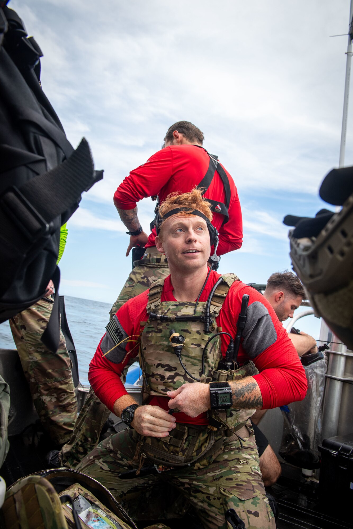 A U.S. Air Force combat rescue officer (CRO) rests after performing a low-altitude jump during a battlefield circulation exercise in the Gulf of Mexico, June 24, 2024. CROs are responsible for rescuing personnel, recovering national assets and leading special operations missions that range from hostile engagements to humanitarian aid. (U.S. Air Force photo by 2nd Lt. Benjamin Williams)