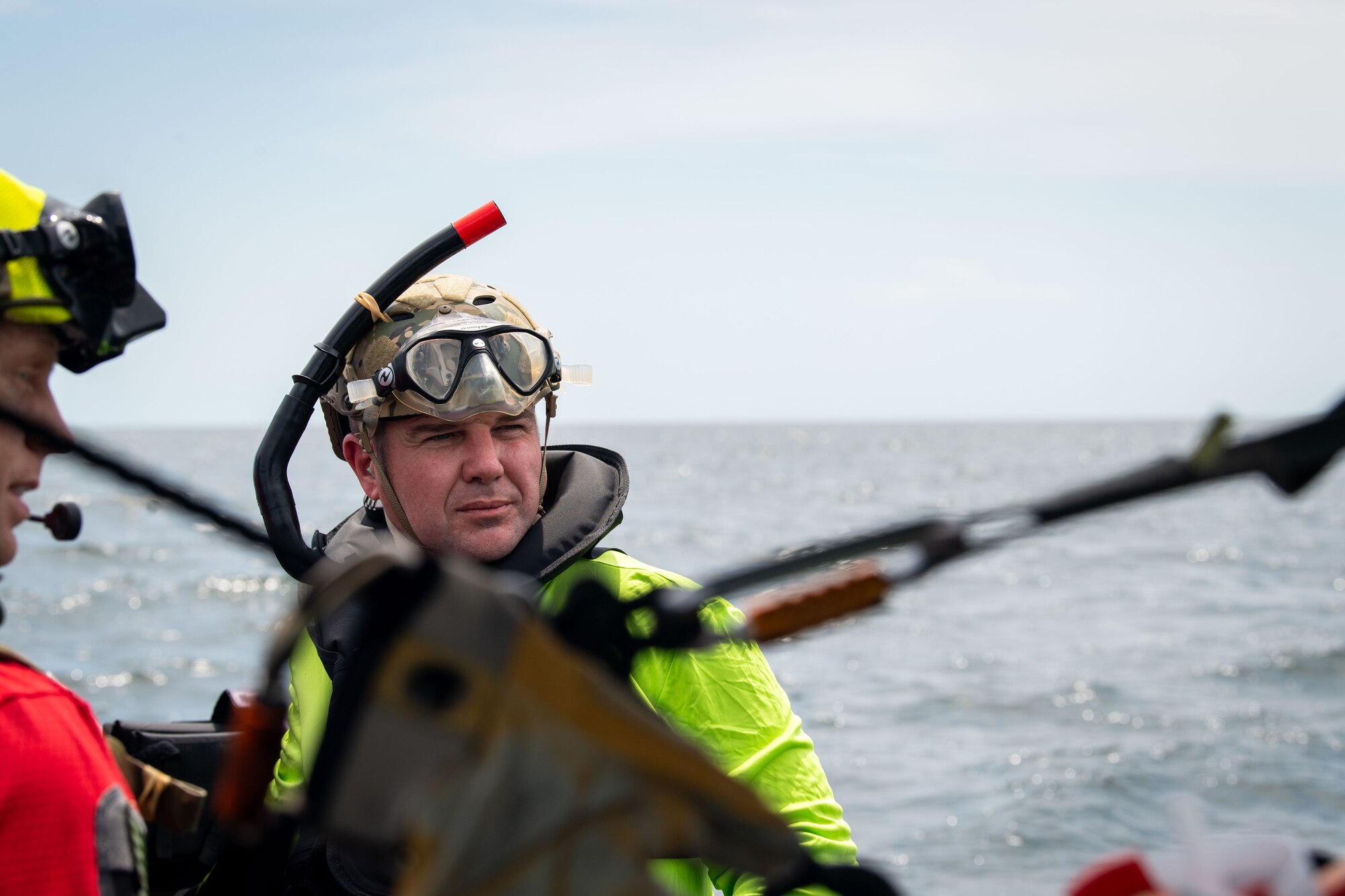 U.S. Air Force Col. Paul Sheets, 23rd Wing commander, poses for a picture in full maritime personal protective equipment during a battlefield circulation in the Gulf of Mexico, June 24, 2024. Sheets was exposed to the agile combat employment capabilities present at Moody Air Force Base, Georgia. The capabilities included maritime expeditionary communication operations, helicopter aerial refueling, helicopter water rescue operations and combat search and rescue. (U.S. Air Force photo by 2nd Lt. Benjamin Williams)