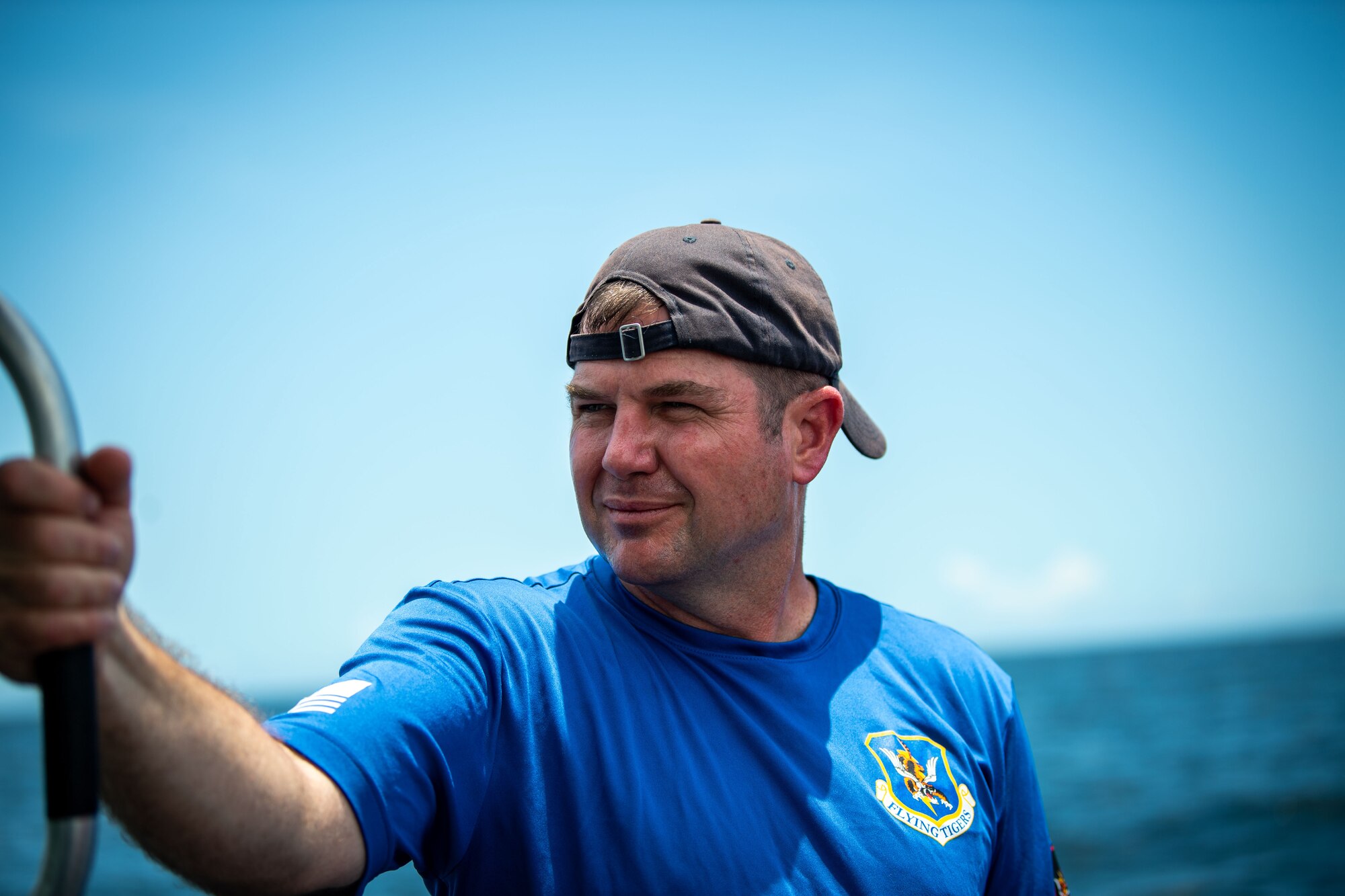 U.S. Air Force Col. Paul Sheets, 23rd Wing commander, poses for a picture during a battlefield circulation in the Gulf of Mexico, June 24, 2024. Sheets was exposed to the agile combat employment capabilities present at Moody Air Force Base, Georgia. The capabilities included maritime expeditionary communication operations, helicopter aerial refueling, helicopter water operations and combat search and rescue. (U.S. Air Force photo by 2nd Lt. Benjamin Williams)