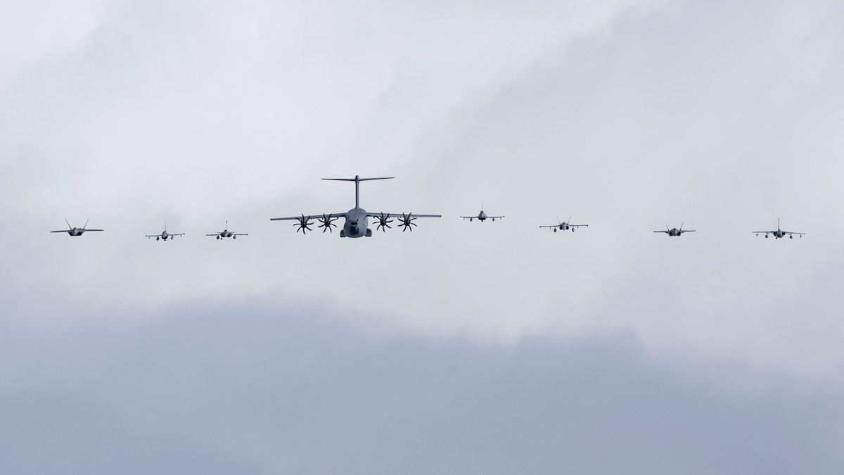 Eight aircraft from America, Germany, Spain and France in a line