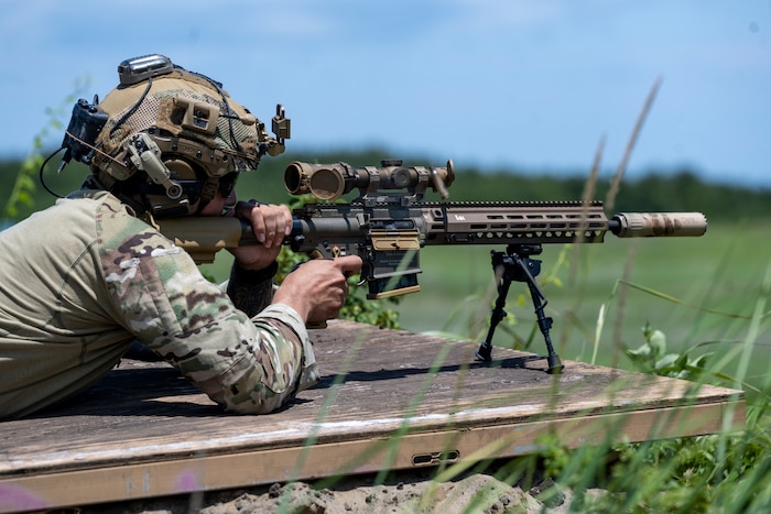 A U.S. Air Force explosive ordnance disposal (EOD) technician participating in Exercise Tanuki Bandit 24 fires an M110 Semi-Automatic Sniper System at Draughn Range near Misawa Air Base, Japan, June 27, 2024.