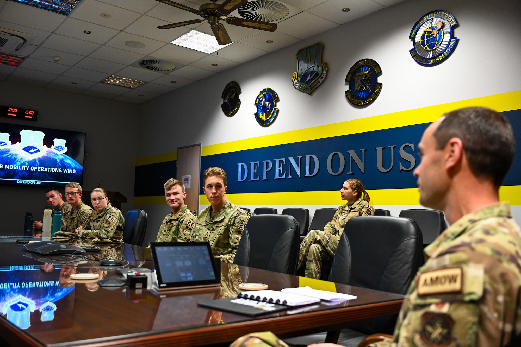 Col. Michael Garrott, far right, 521st Air Mobility Operations Wing deputy commander, gives a mission brief to United States Air Force Academy cadets at the 521 AMOW headquarters building July 8, 2024, on Ramstein Air Base, Germany.