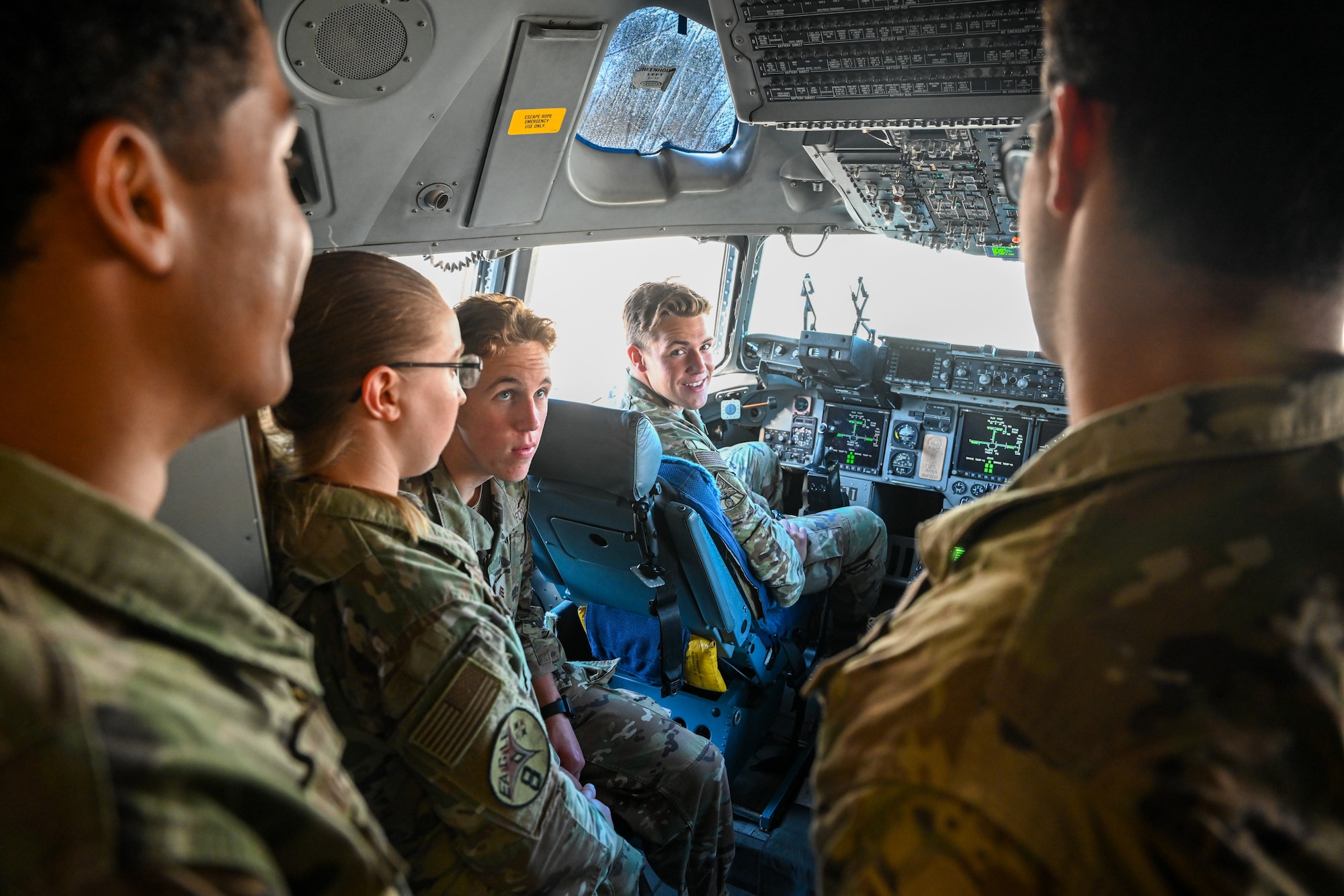 United States Air Force Academy cadets sit in the cockpit of a C-17 Globemaster III on Ramstein Air Base, Germany, July 8, 2024.