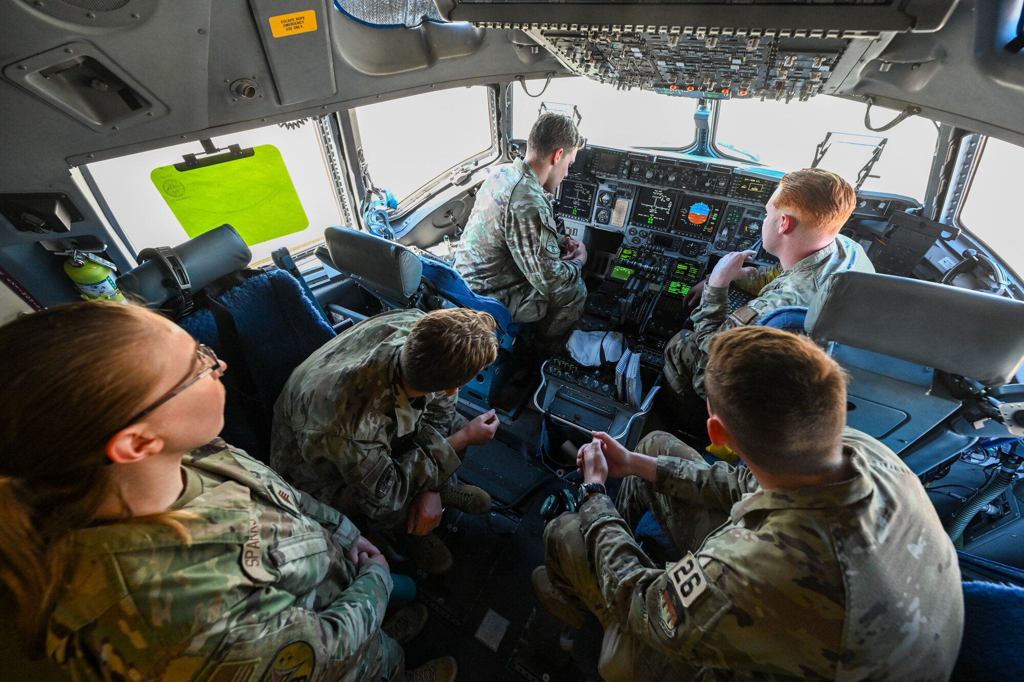 United States Air Force Academy cadets sit in the cockpit of a C-17 Globemaster III on Ramstein Air Base, Germany, July 8, 2024.