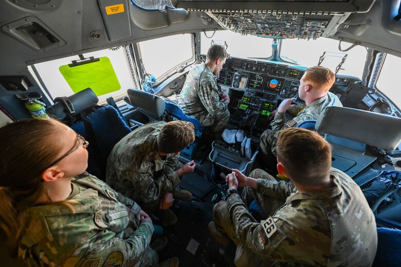 United States Air Force Academy cadets sit in the cockpit of a C-17 Globemaster III on Ramstein Air Base, Germany, July 8, 2024.