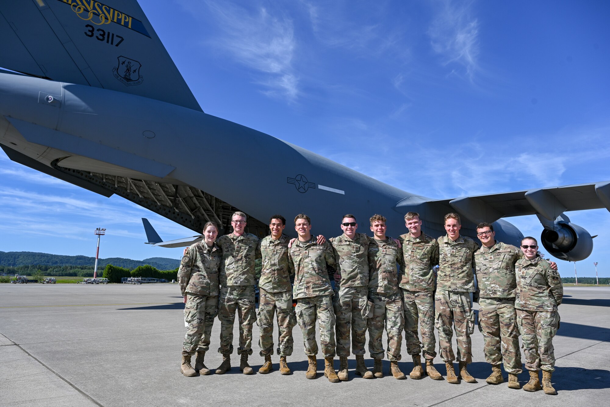 United States Air Force Academy cadets pose for a photo in front of a C-17 Globemaster III on the flightline at Ramstein Air Base, Germany, July 8, 2024.