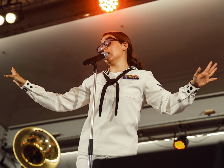 Musician 3rd Class Marisol Arreola of the 7th Fleet Band performs at the Commander, Fleet Activities Yokosuka 4th of July Celebration July 4, 2024 at the installation's Berkey Field.