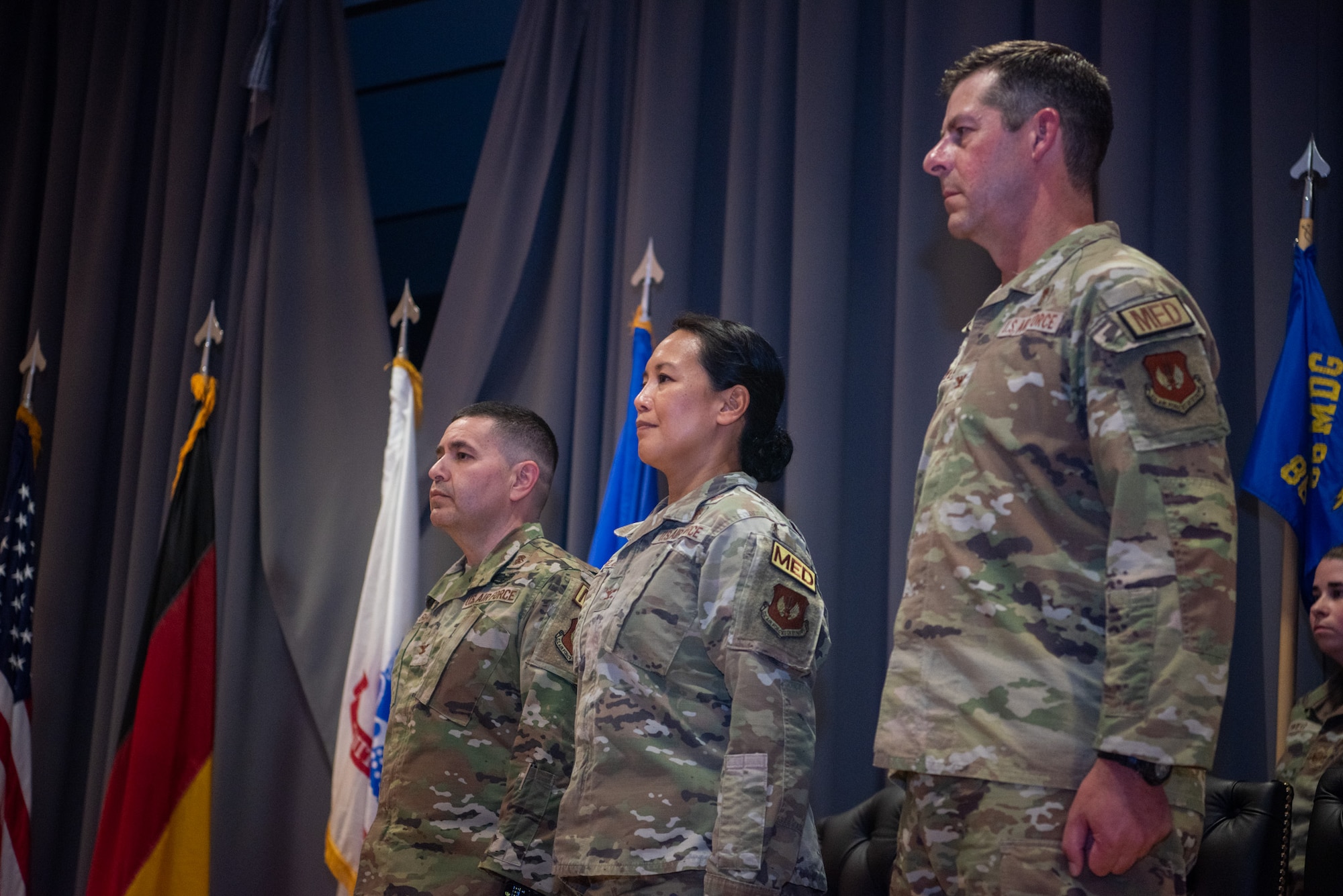 Commanders stand at attention.