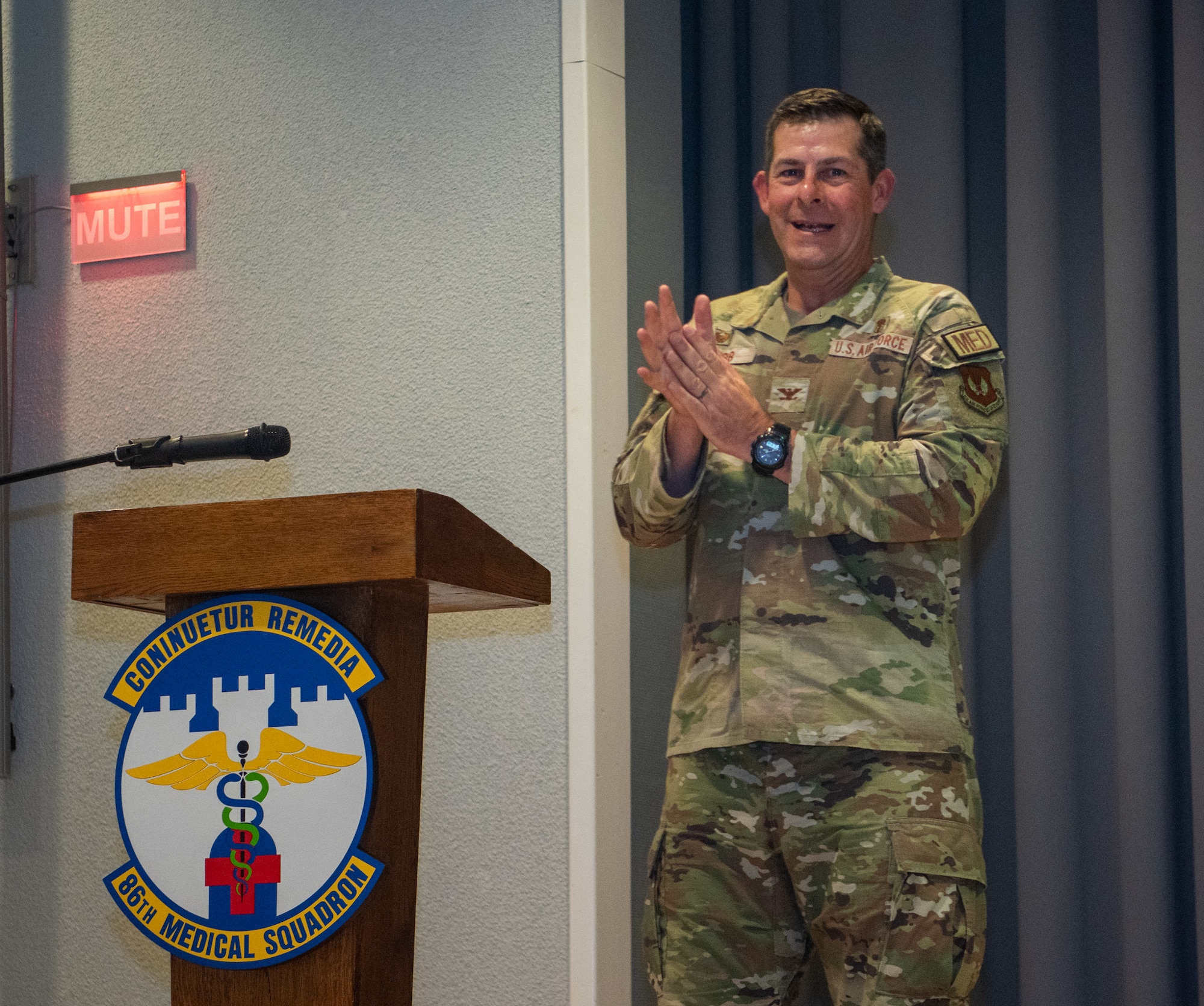Commander speaks to audience.