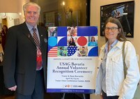 Birgit Joyce, a supply technician with Base Support Operations Maintenance, 405th Army Field Support Brigade, poses for a photo with her husband, James Joyce, at the U.S. Army Garrison Bavaria Annual Volunteer Recognition Ceremony at Tower Barracks in Grafenwoehr, Germany. Joyce was selected as USAG Bavaria Host Nation Volunteer of the Year for 2024. (U.S. Army courtesy photo)