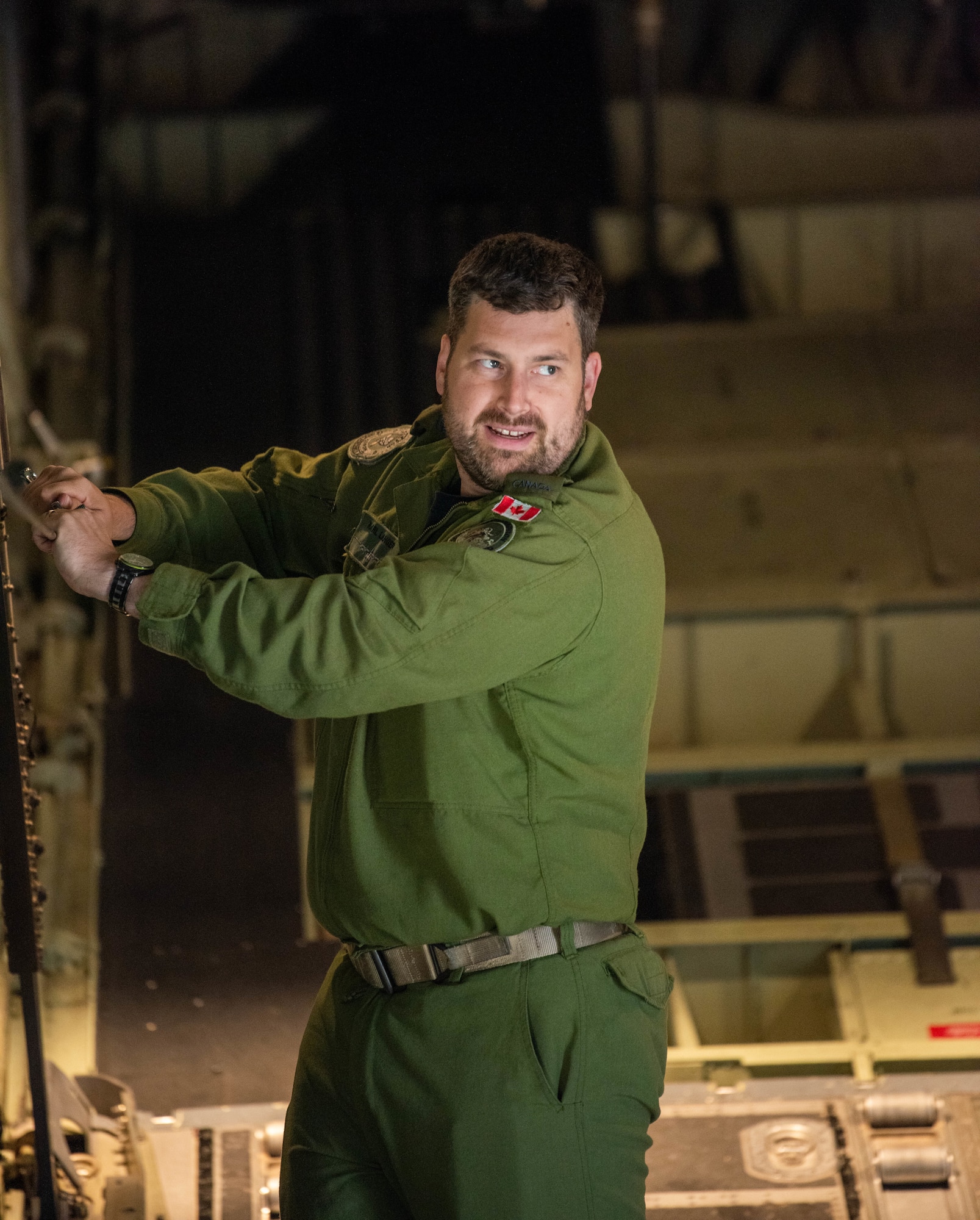 Service member checks anchor cable.