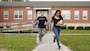 U.S. Marine Corps Gunnery Sgt. Vincent Song, left, a transmissions chief, and Cpl. Ana Perezaguilar, right, a radio operator, with 8th Communication Battalion, II Marine Expeditionary Force (II MEF), review a clue on their way ro the next station during the Sexual Assault Prevention and Response (SAPR) scavenger hunt, on Marine Corps Base Camp Lejeune, North Carolina, April 26, 2024. The scavenger hunt was a collaborative event, used to inform Marines about SAPR related resources available on base. (U.S. Marine Corps photo by Cpl. Emily Hazelbaker)