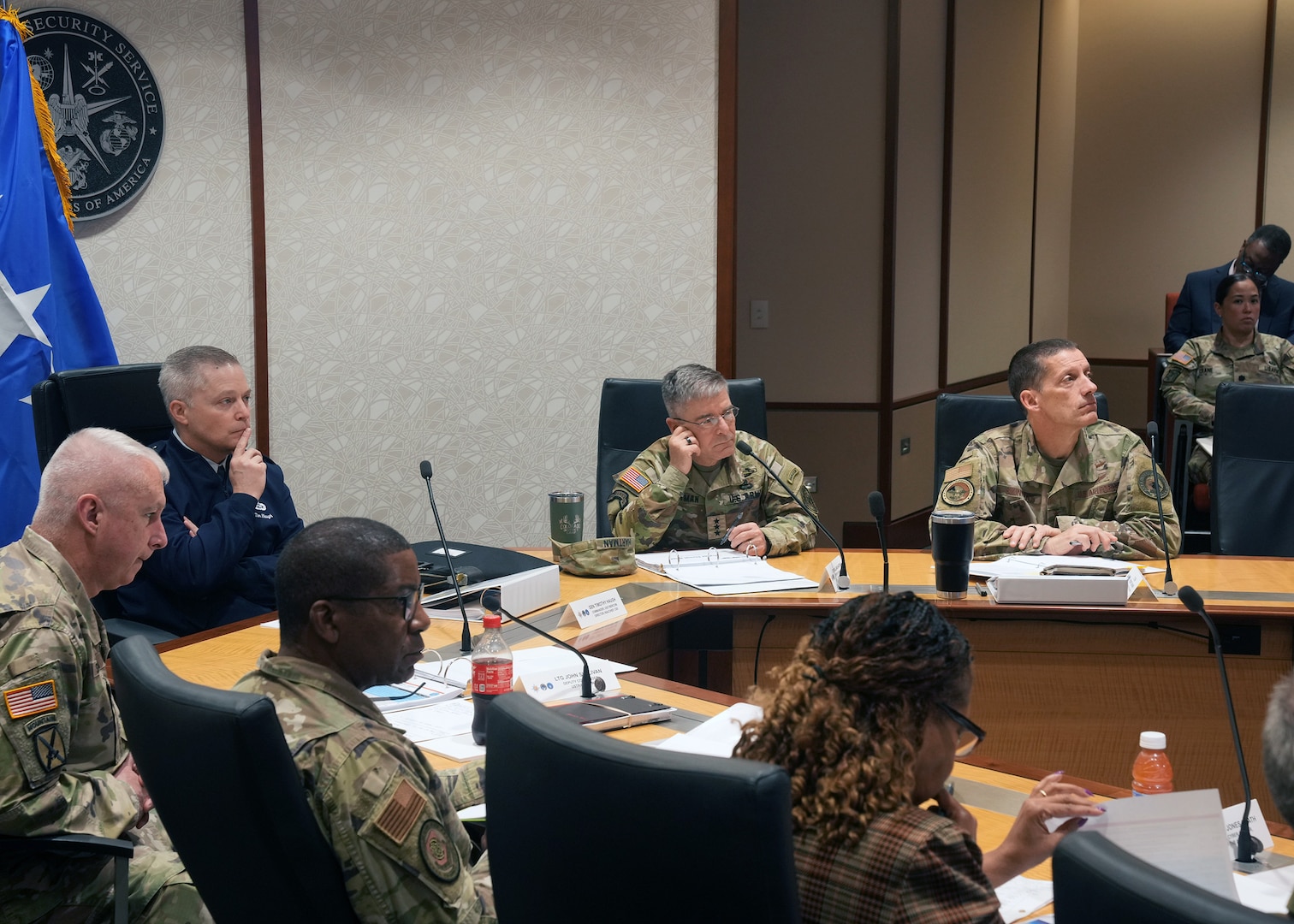 Air Force Gen. Timothy D. Haugh, commander of U.S. Cyber Command, Director of National Security Agency, and Chief of the Central Security Service, receives an outbrief during the Global Logistics Cyber Resiliency Summit. Senior leaders and staff from over 35 commands converged on Fort Meade June 11 and 12 to participate in the summit hosted by U.S. Transportation Command, U.S. Cyber Command and Joint Force Headquarters-Department of Defense Information Network. (Department of Defense photo by MCC(SW/AW) Thomas Miller/Released)