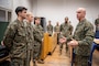U.S. Marine Corps Lt. Gen. David Ottignon, commanding general of II Marine Expeditionary Force (II MEF) speaks to Marines with 8th Communication Battalion about the importance of their work during exercise Nordic Response 24, Bardufoss, Norway, March 4, 2024. II MEF Marines are participating in exercise Nordic Response 24 which is a Norwegian national readiness and defense exercise designed to enhance military capabilities and allied cooperation. This exercise will test military activities ranging from the reception of allied and partner reinforcements and command and control interoperability to combined joint operations, maritime prepositioning force logistics, integration under challenging Arctic conditions, in high-intensity warfighting including rugged terrain and extreme cold weather with NATO militaries and reacting against an adversary force during a dynamic training environment. (U.S. Marine Corps photo by Cpl. Jacquilyn Davis) (This photo has been altered for security purposes by blurring out identification badges.)
