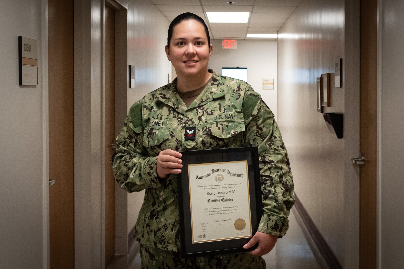 Hospital Corpsman Second Class Rylie Maloney is the first military applicant to receive an Optician’s License from the state of North Carolina after passing the American Board of Opticianry exam in early summer, 2024.  
Maloney, a native of Soddy Daisy, Texas, serves aboard Naval Health Clinic Cherry Point as the Optometry Leading Petty Officer, responsible for the day-to-day operations of the facility’s Optometry Clinic serving Active-Duty Marines and Sailors assigned to the base, their families and beneficiaries in the surrounding communities.