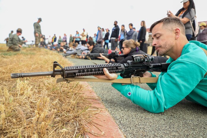 Kevin Taylor, a Houston, Texas-area educator, sights in with an M16A4 service rifle during Educator's Workshop at Marine Corps Base Camp Pendleton, Calif., May 29, 2023. Educator's Workshop is a four-day program, held annually, designed to inform high school and college educators about the commitment and benefits of service in the U.S. Marine Corps. Attendees then return to their place of business with the ability to provide firsthand experience and knowledge to individuals interested in military service. (U.S. Marine Corps photo by Sgt. Ryan H. Pulliam)