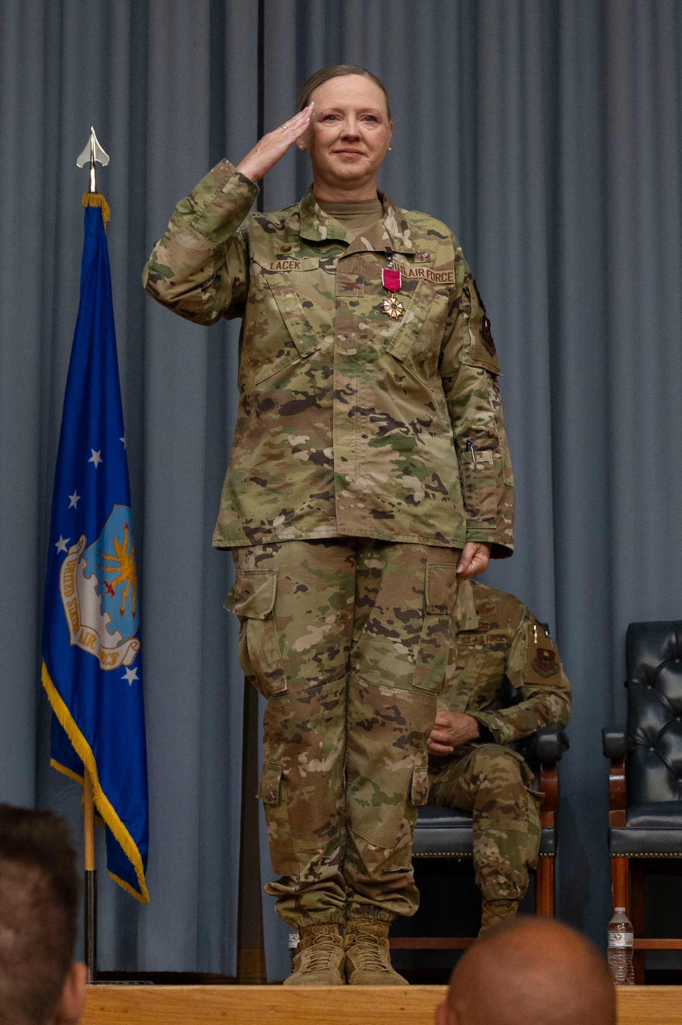 U.S. Air Force Col. Angela Lacek, former 47th Medical Group (MDG) commander, gives a final salute as commander to her unit during the 47th MDG change of command ceremony at Laughlin Air Force Base, Texas, July 9, 2024. As commander of the 47th MDG, Lacek led 145 Airmen, civilians and contractors who support the 47th Flying Training Wing by ensuring the medical readiness and health care of 1,500 Active Duty, 400 Reservists and 3,200 additional beneficiaries. (U.S. Air Force photo by Senior Airman Kailee Reynolds)