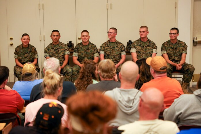 U.S. Marines with Delta Company, 2nd Recruit Training Battalion, talk about their experiences in recruit training to educators from across 8th Marine Corps District attend the third day of Educator's Workshop at Marine Corps Recruit Depot San Diego, Calif., May 30, 2023. Educator's Workshop is a four-day program, held annually, designed to inform high school and college educators about the commitment and benefits of service in the U.S. Marine Corps. Attendees then return to their place of business with the ability to provide firsthand experience and knowledge to individuals interested in military service. (U.S. Marine Corps photo by Sgt. Ryan H. Pulliam)
