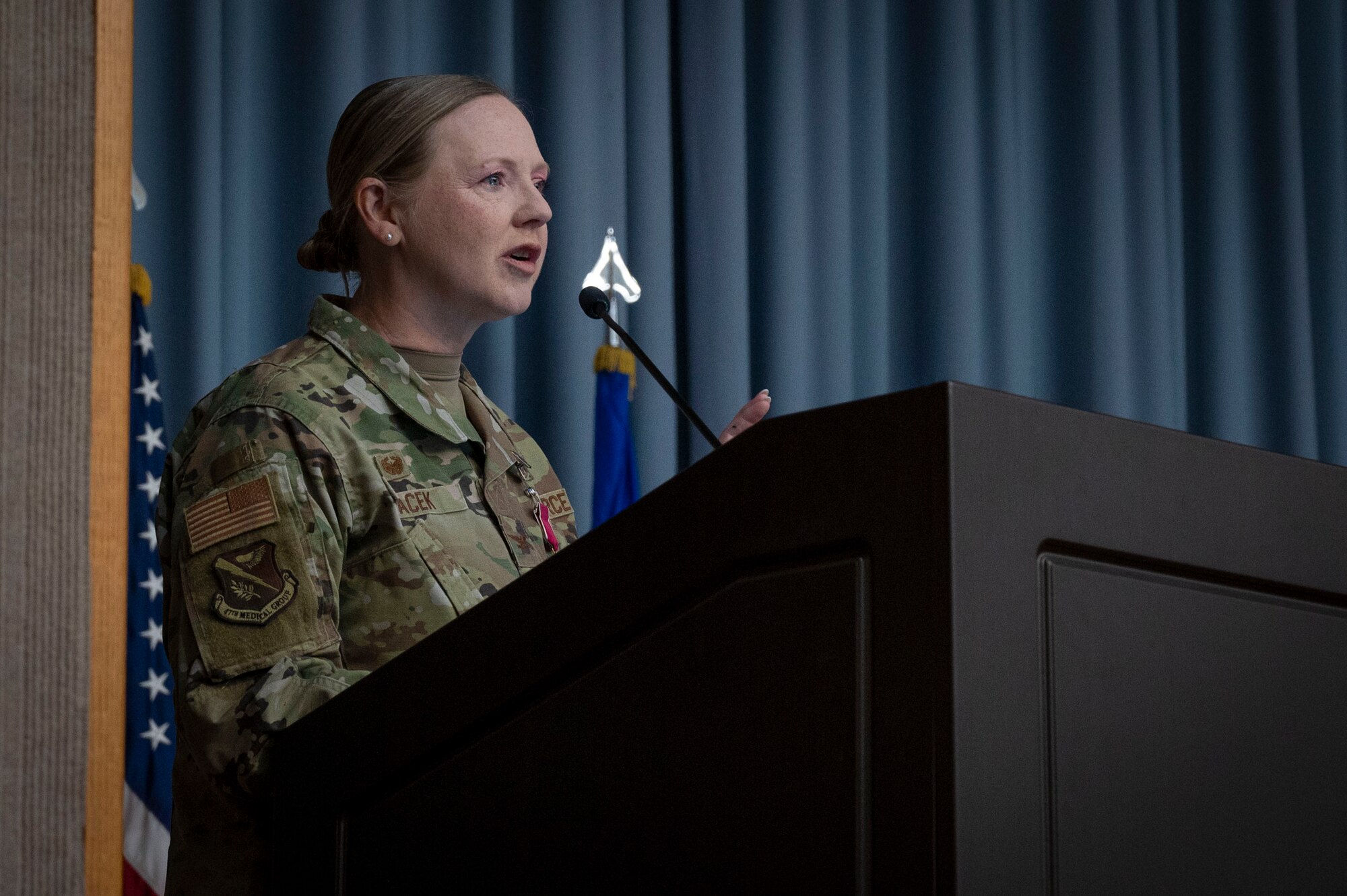 U.S. Air Force Col. Angela Lacek, former 47th Medical Group (MDG) commander, delivers a speech during the 47th MDG change of command ceremony at Laughlin Air Force Base, Texas, July 9, 2024. As commander of the 47th MDG, Lacek led 145 Airmen, civilians and contractors who support the 47th Flying Training Wing by ensuring the medical readiness and health care of 1,500 Active Duty, 400 Reservists and 3,200 additional beneficiaries. (U.S. Air Force photo by Senior Airman Kailee Reynolds)