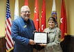 U.S. Army Reserve Ambassador Robert F. Pleczkowski of Pennsylvania receives the Patriotic Public Service Award June 13 during an annual training workshop held at 99th Readiness Division headquarters on Joint Base McGuire-Dix-Lakehurst, New Jersey. The award was presented by Maj. Gen. Kris A. Belanger, 99th RD commanding general. (U.S. Army photo by Mr. Shawn Morris, 99th RD Public Affairs)