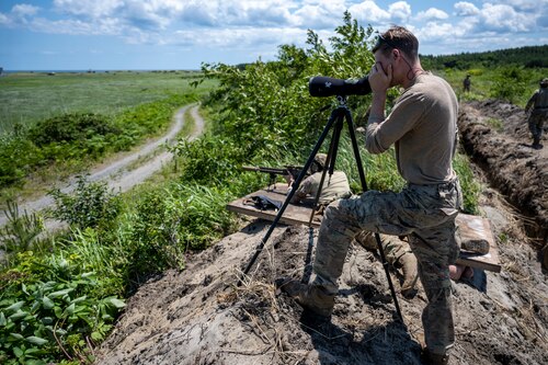 A U.S. Air Force explosive ordnance disposal (EOD) technician participating in Exercise Tanuki Bandit 24 performs spotter duties at Draughn Range near Misawa Air Base, Japan, June 27, 2024.
