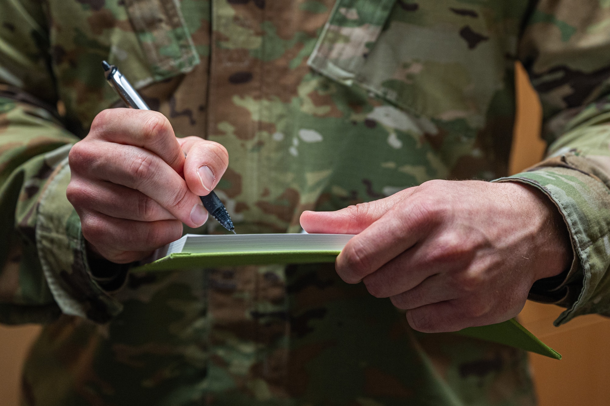U.S. Air Force Tech. Sgt. Justin Manning, 51st Fighter Wing Safety Office noncommissioned officer in charge of occupational safety, takes notes during an inspection of the U.S. Air Force Audit Agency at Osan Air Base, Republic of Korea, April 9, 2024. Buildings are inspected by the safety office to minimize the risk of mishaps and non-adherence to OSHA guidance and processes. (U.S. Air Force photo by Airman 1st Class Chase Verzaal)