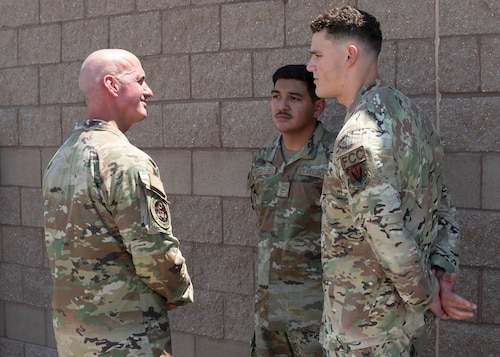 Chief Master Sergeant of the Air Force David Flosi talks with 355th Wing Airmen before departure at Davis-Monthan Air Force Base, Ariz., July 9, 2024. Flosi visited the installation to get a firsthand look at how Airmen support their unit’s mission and thanked them for their hard work and commitment. (U.S. Air Force photo by Airman 1st Class William Finn V)