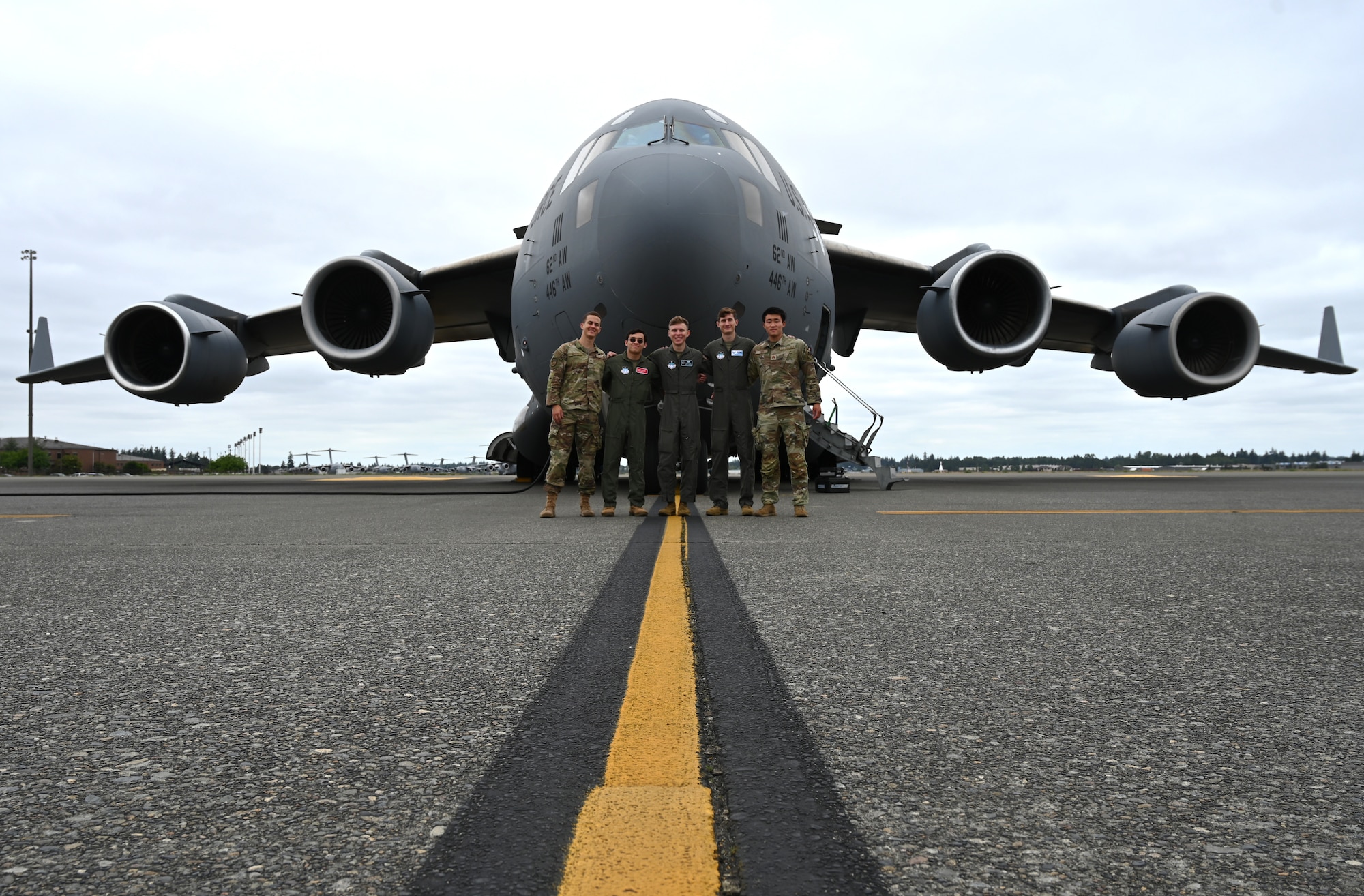 U.S. Air Force cadets from the United States Air Force Academy stand in front of a C-17 Globemaster III during their visit to Joint Base Lewis-McChord, Washington, July 2, 2024.