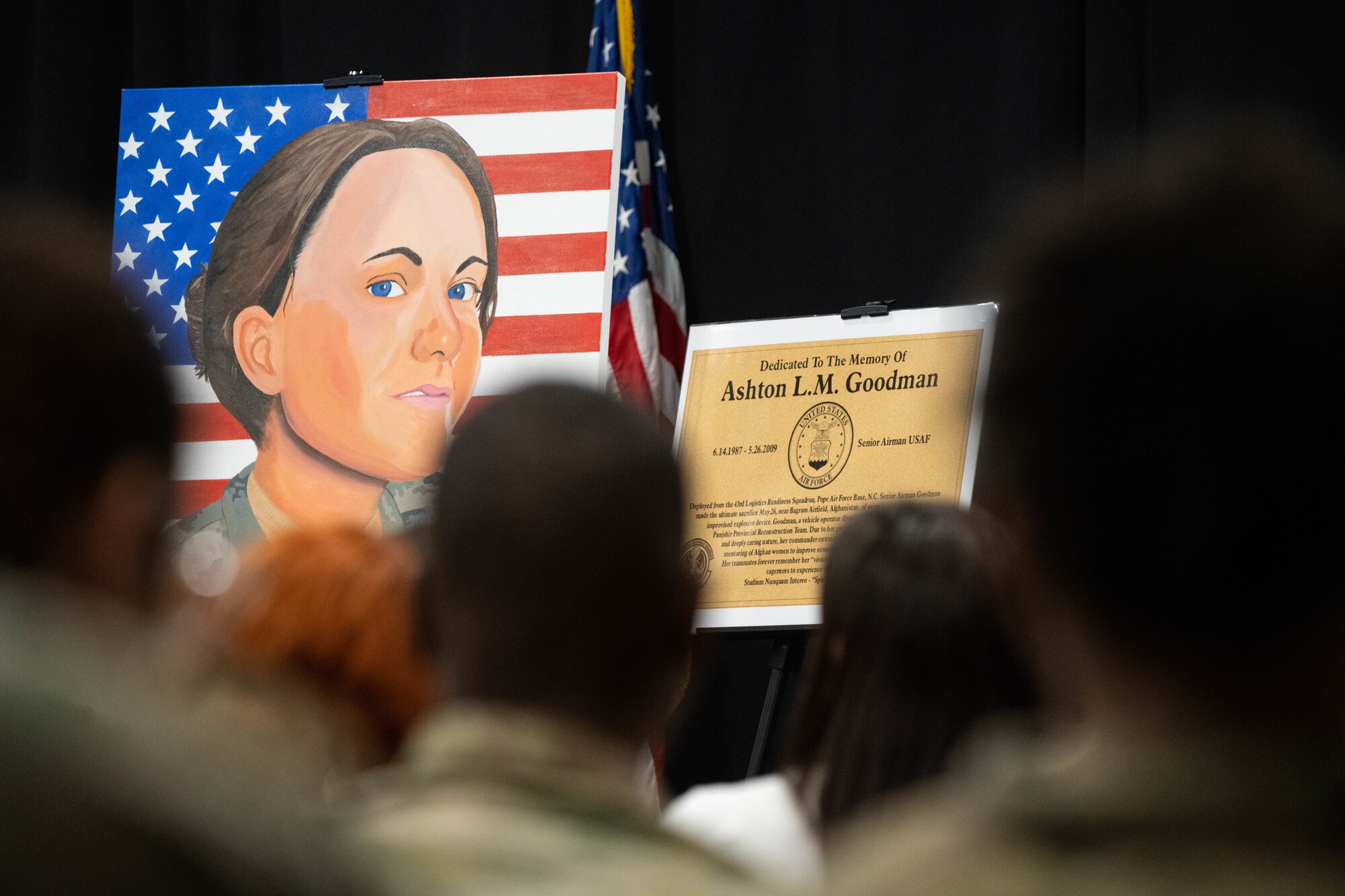 Painting portrait of U.S. Airman sits on easel.