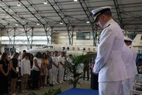 Chaplain Terry Bewley performs invocation during a change of command ceremony for Commander, Task Force 63/Military Sealift Command Europe and Africa, July 10, 2024.