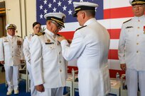 Vice Adm. Thomas E. Ishee, commander, U.S. 6th Fleet and Naval Striking and Support Forces NATO, pins Legion of Merit award on Capt. Kenneth S. Pickard, the commanding officer of Commander, Task Force 63/Military Sealift Command Europe and Africa, during change of command ceremony, July 10, 2024.
