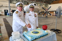 Captain Todd B. Penrod, incoming commanding officer of Commander, Task Force 63/Military Sealift Command Europe and Africa, and Captain Kenneth S. Pickard, former commanding officer of CTF-63/Military Sealift Command Europe and Africa, participate in cake cutting during change of command ceremony, July 10, 2024.
