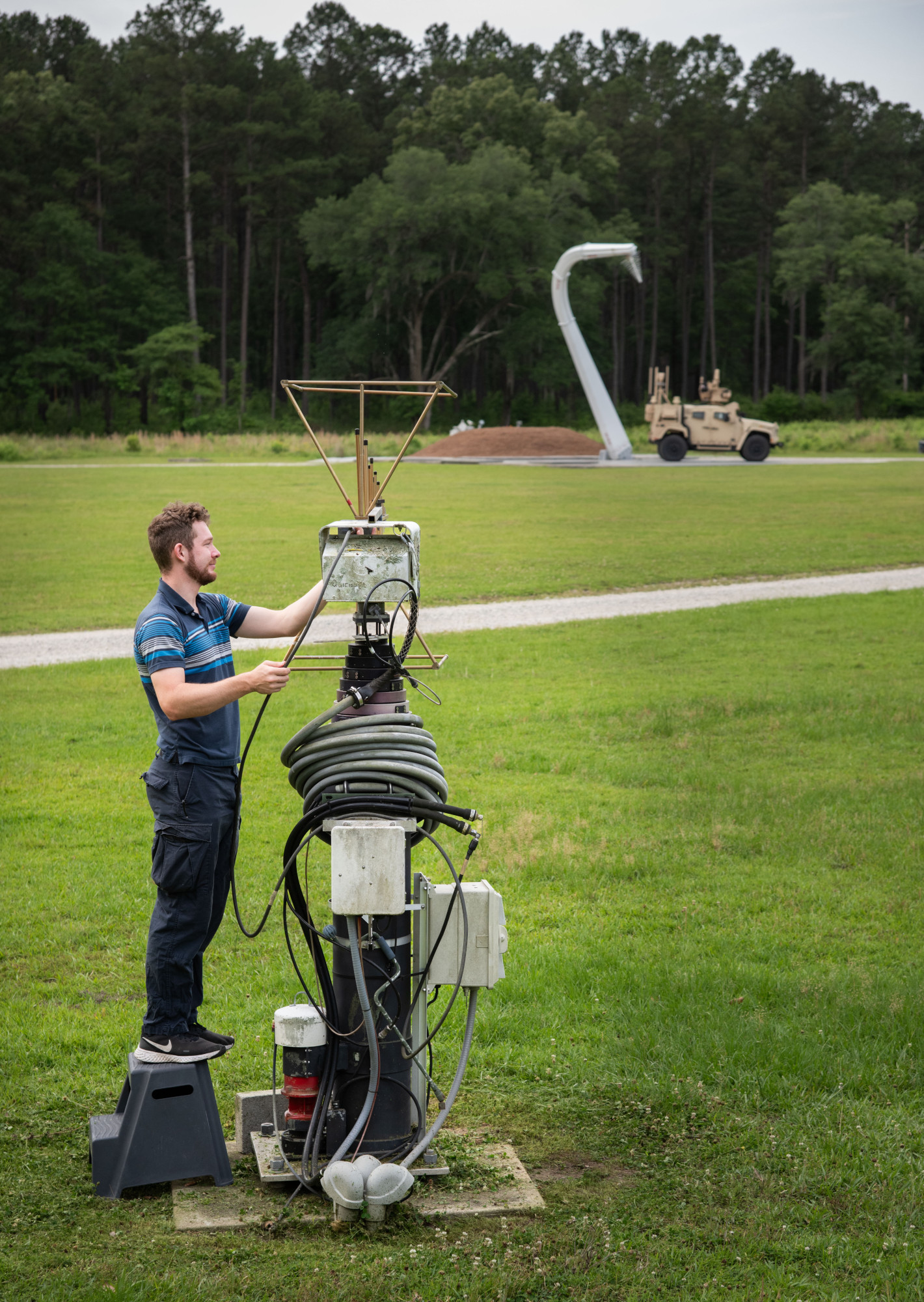 The Naval Information Warfare Center (NIWC) Atlantic's Radio Frequency Test Facility (RFTF) Poseidon Park is a unique testing facility as it is located outside, which enables testing of antennas installed on military vehicles in a more realistic environment, taking into account the potential impact of external radio frequency (RF) interference and environmental conditions.