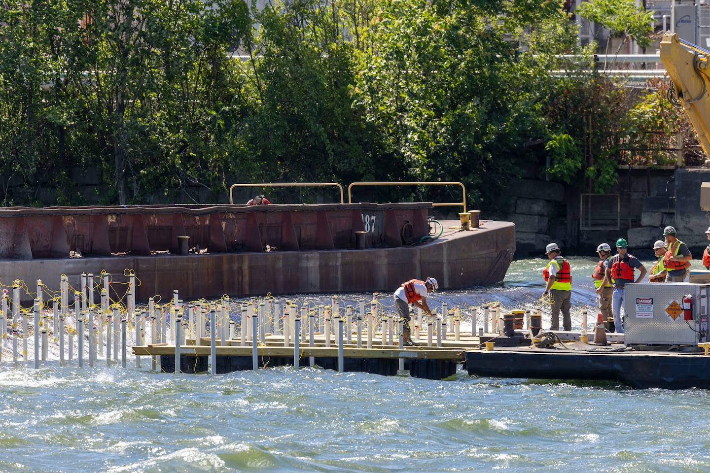 The U.S. Army Corps of Engineers Pittsburgh District uses explosives to breach the fixed-crest dam at Monongahela River Locks and Dam 3 near Elizabeth, Pennsylvania, July 10, 2024.