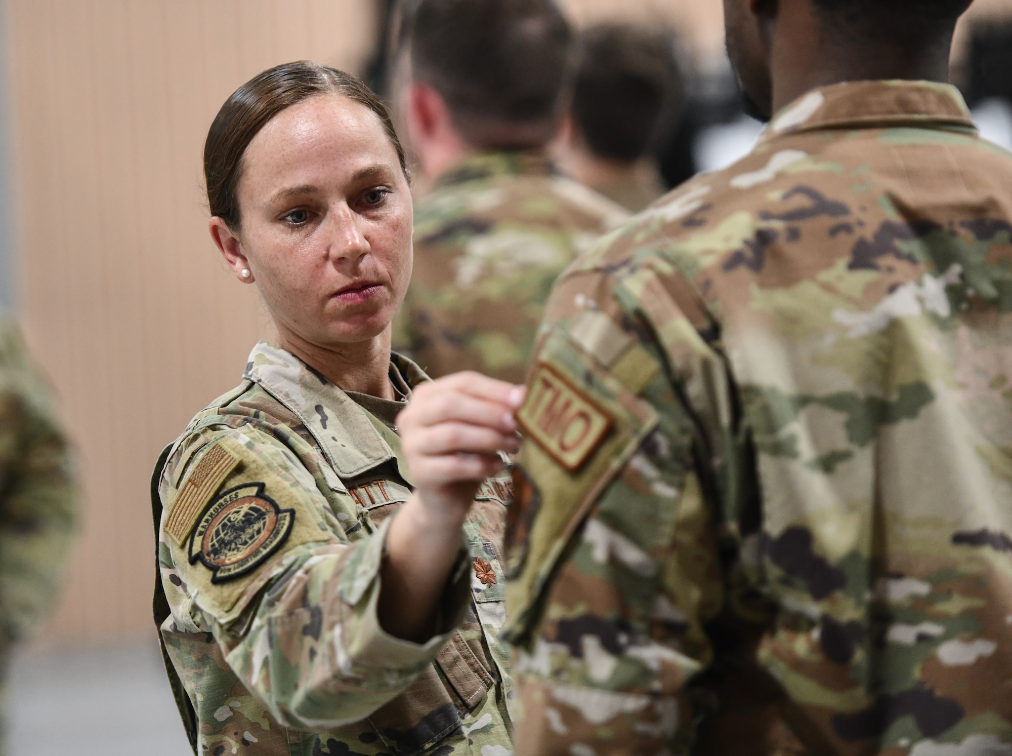 Officer inspects uniform