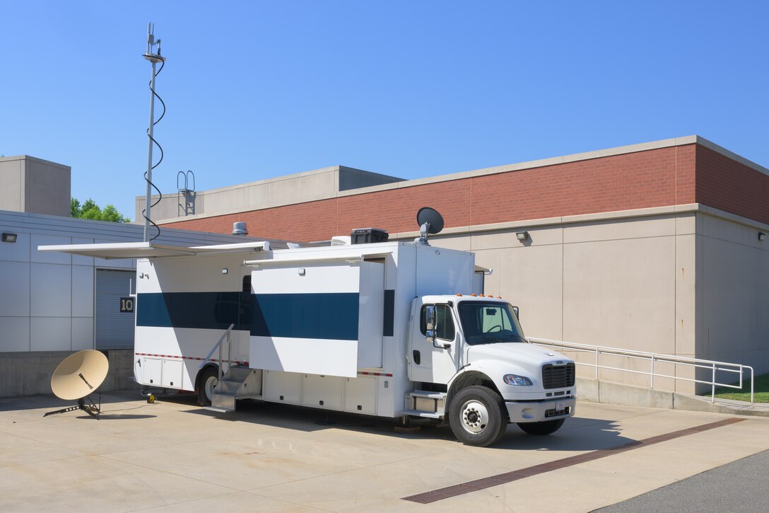 The mobile command center truck is staged at the McNamara Headquarters Complex
