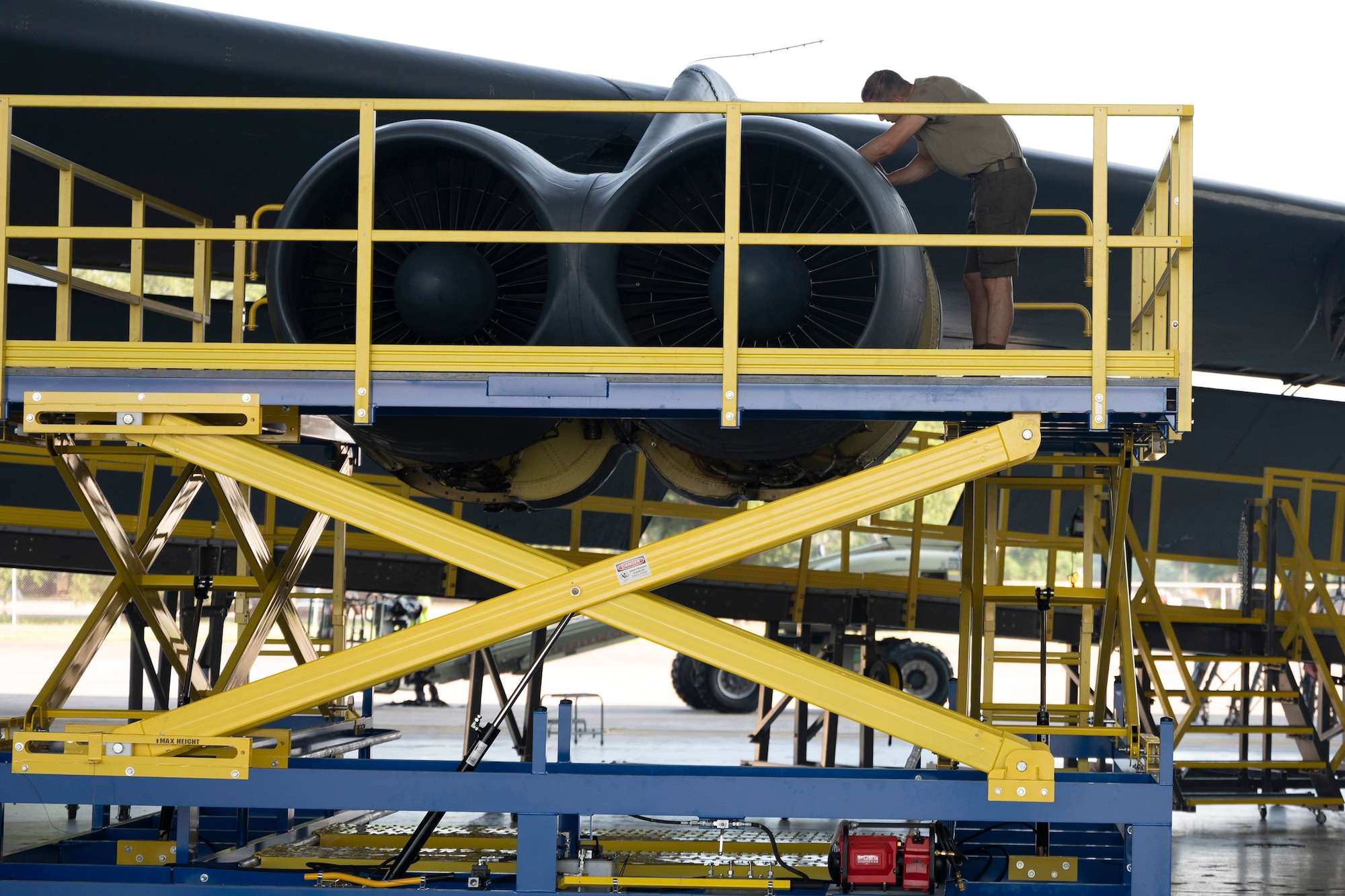 Airmen work on Engine Pod Stands.