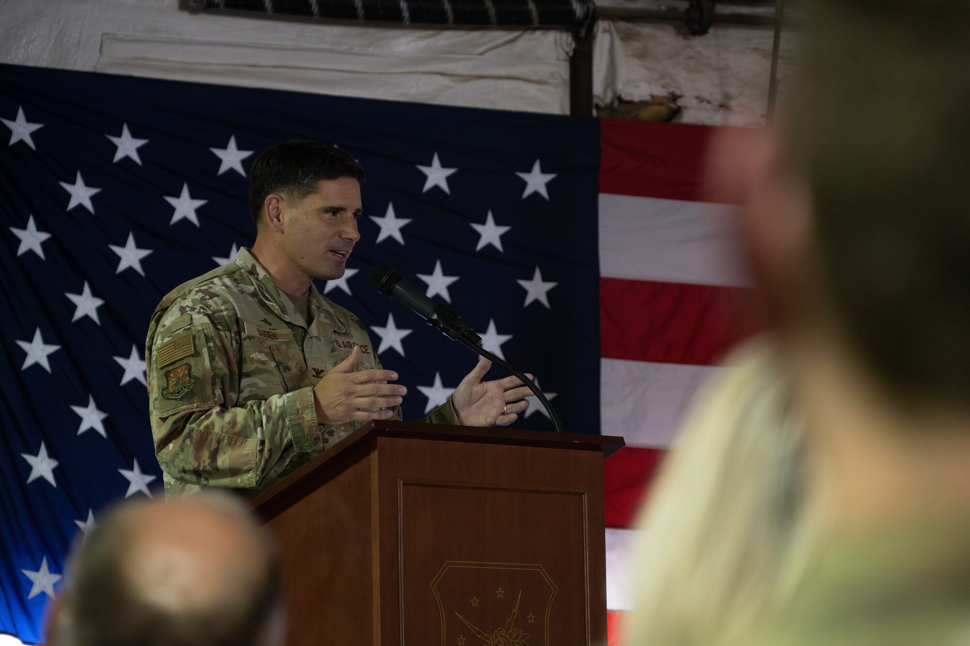U.S. Air Force Col. Mike Suden, 91st Operations Group (OG) commander, speaks during the 91st OG assumption of command ceremony at Minot Air Force Base, North Dakota, July 10, 2024. The 91st OG is comprised of four squadrons; the 91st Operations Support Squadron, and the 740th, 741st and 742nd Missile Squadrons that continue to be an essential component of the U.S.’s deterrent force, maintaining Minot's missiles in a safe, secure and operational state. (U.S. Air Force photo by Airman 1st Class Alyssa Bankston)