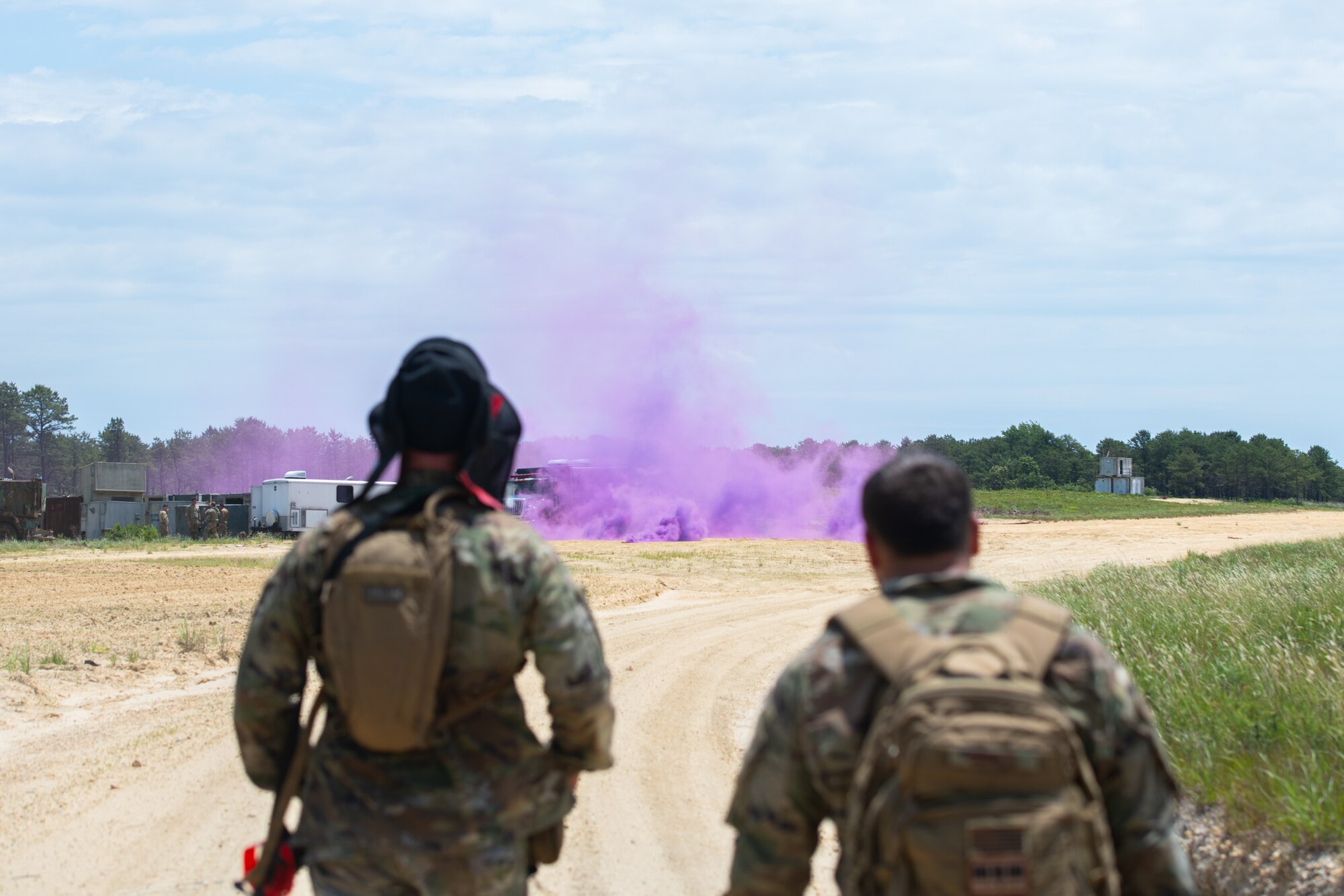 Airmen assigned to the 171st Civil Engineer Squadron and the 177th Civil Engineer Squadron perform land navigation and simulated combat training exercises as part of the Piney Devil training exercise on June 9, 2024, at Warren Grove Range, New Jersey.