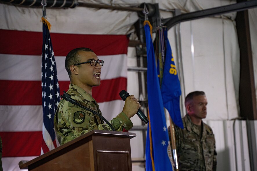 U.S. Air Force 2nd Lt. Elijah Robinson, 741st Missile Squadron nuclear and missile operator, sings the national anthem at the 91st Operations Group (OG) assumption of command ceremony at Minot Air Force Base, North Dakota, July 10, 2024. The 91st OG is comprised of four squadrons; the 91st Operations Support Squadron, and the 740th, 741st and 742nd Missile Squadrons that continue to be an essential component of the U.S.’s deterrent force, maintaining Minot's missiles in a safe, secure and operational state. (U.S. Air Force photo by Airman 1st Class Alyssa Bankston)