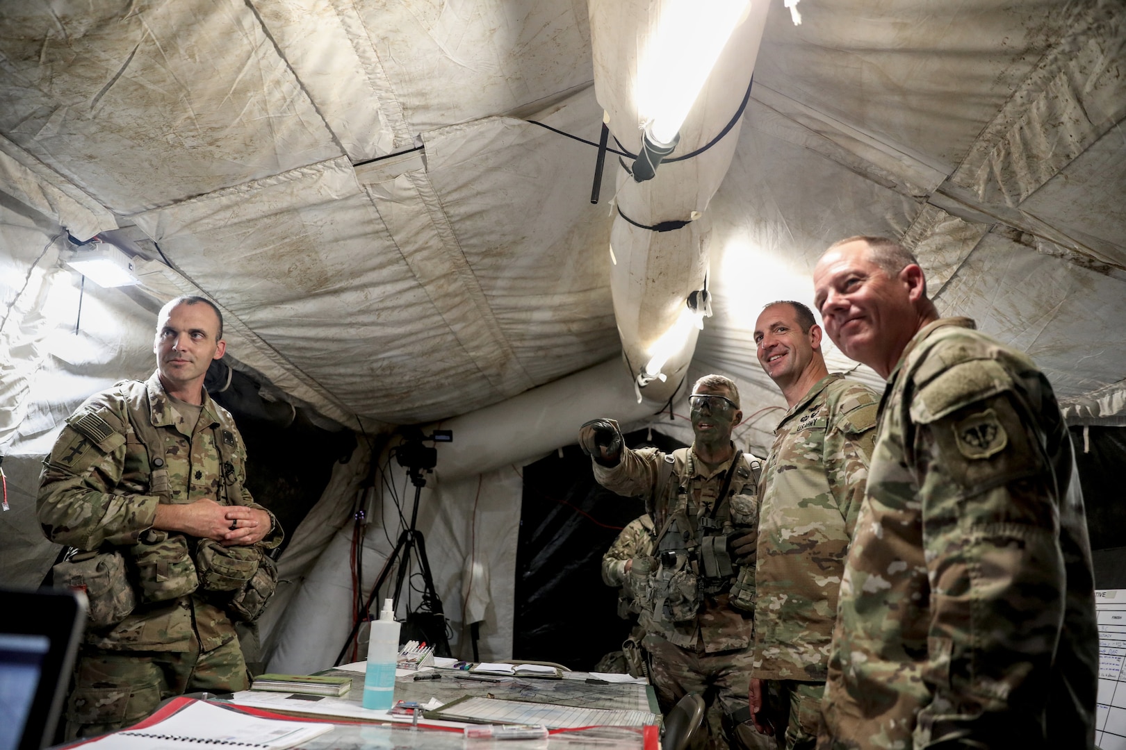 Col. Matthew Elder, commander of the Wisconsin Army National Guard’s 32nd Infantry Brigade Combat Team, briefs Brig. Gen. Matthew J. Strub, Wisconsin’s deputy adjutant general for Army, and Command Chief Warrant Officer Charles Mattison, along with other state leadership on the current training status June 15 at the Joint Readiness Training Center (JRTC) on Fort Johnson, La. Strub described the time at JRTC as “the closest thing to combat that a Soldier can do, and train to be ready for the future fight.” 32nd IBCT Photo by Staff Sgt. Kati Volkman