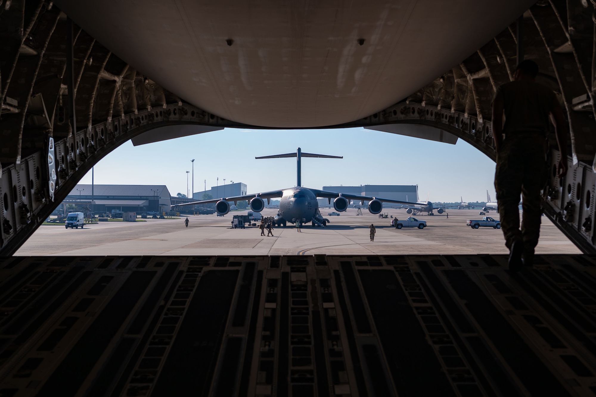 U.S. Air Force C-17 Globemaster III assigned to the 6th Airlift Squadron waits to depart for exercise Valiant Shield at Joint Base McGuire-Dix-Lakehurst, N.J., June 4, 2024. The exercise allows for the integration of all service branches in the Indo-Pacific Command Joint Forces area of responsibility to conduct precise, lethal and multi-domain capabilities with our allies. (U.S. Air Force photo by Staff Sgt. Monica Roybal)