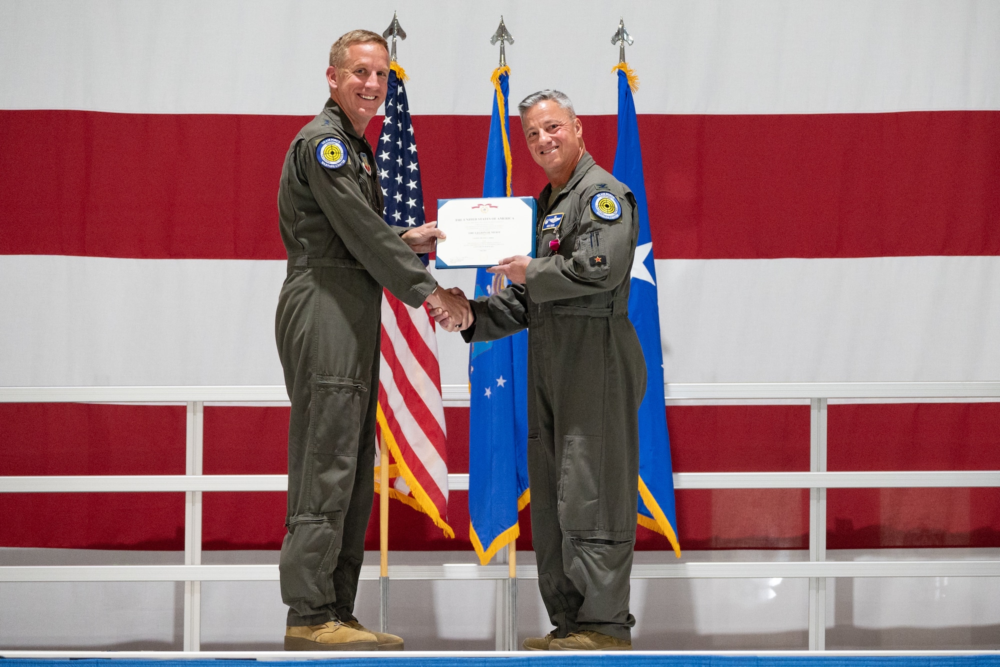 Former Nevada Test and Training Range commander receives the Legion of Merit Award from U.S. Air Force Warfare Center commander