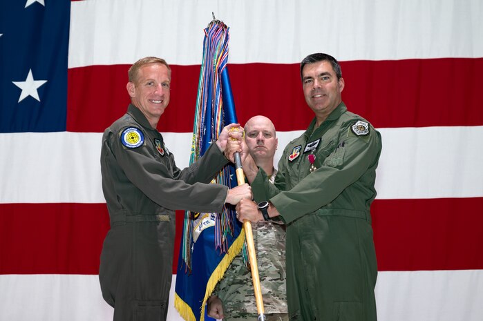 U.S. Air Force Warfare Center commander passes guidon to former 57th Wing commander