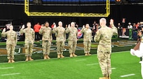 AR-MEDCOM DCG Collard leads affirmation of enlistment ceremony at Arena Football game