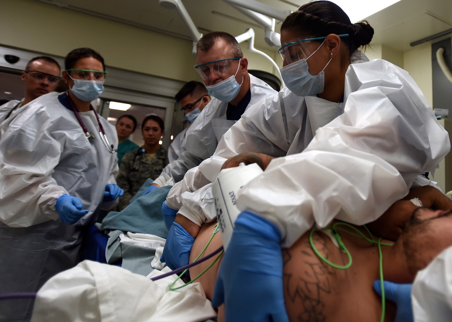 Emergency room personnel treat patient