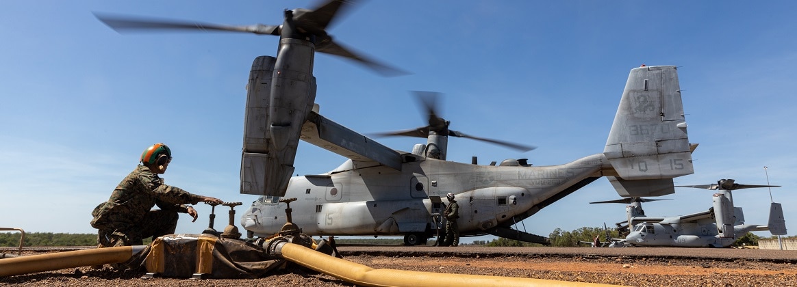 U.S. Marines with Marine Medium Tiltrotor Squadron 268 (Reinforced), Marine Rotational Force – Darwin 24.3, refuel an MV-22B Osprey in preparation for an air delivery exercise at Royal Australian Air Force Base Darwin, NT, Australia, July 9, 2024.