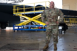 Airmen work on Engine Pod Stands.